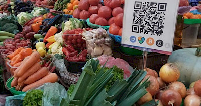 На базар з біткоїном: на Бессарабському ринку почали приймати криптовалюту